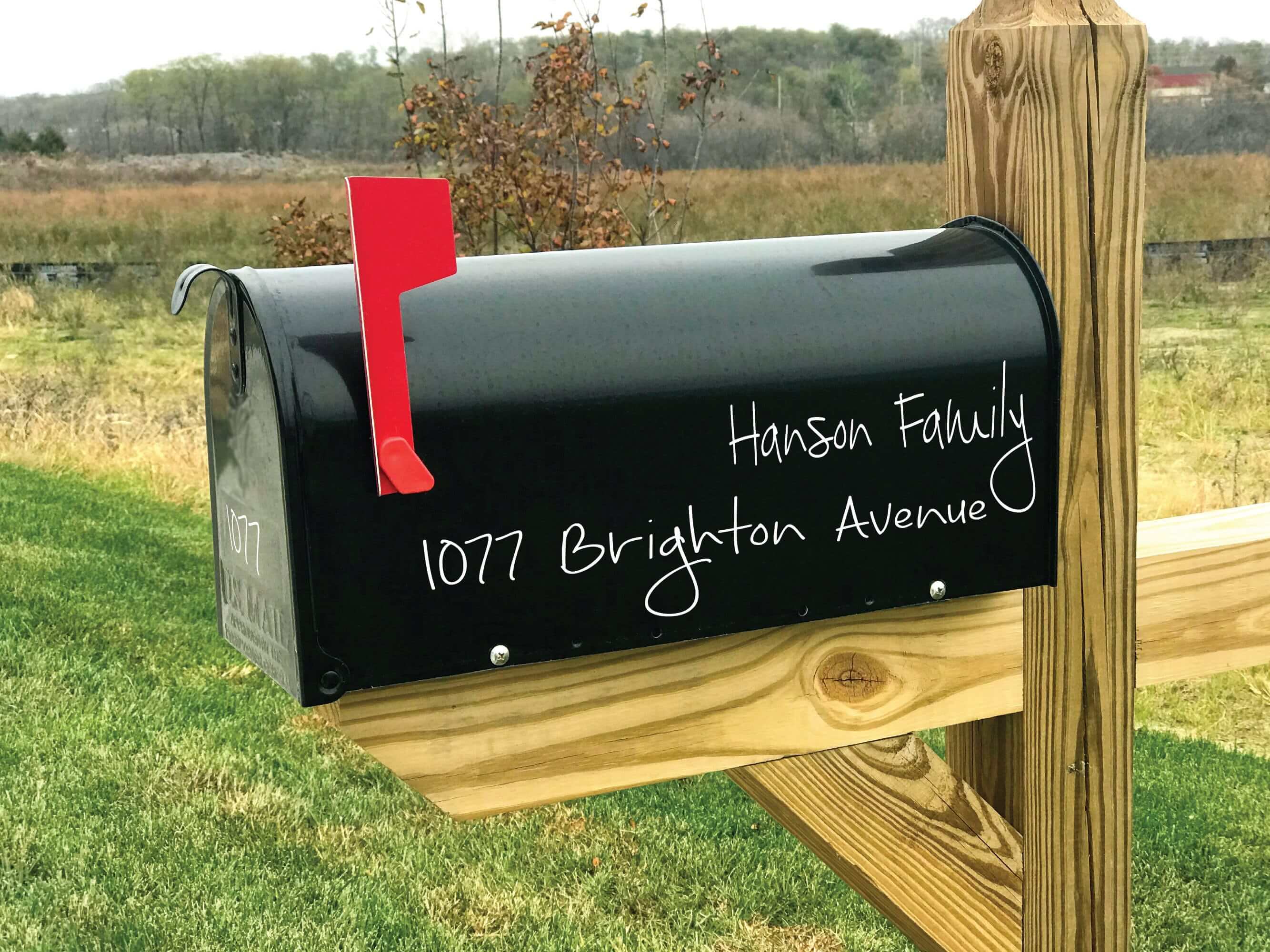 Personalized handwriting-style mailbox decal for curb appeal.