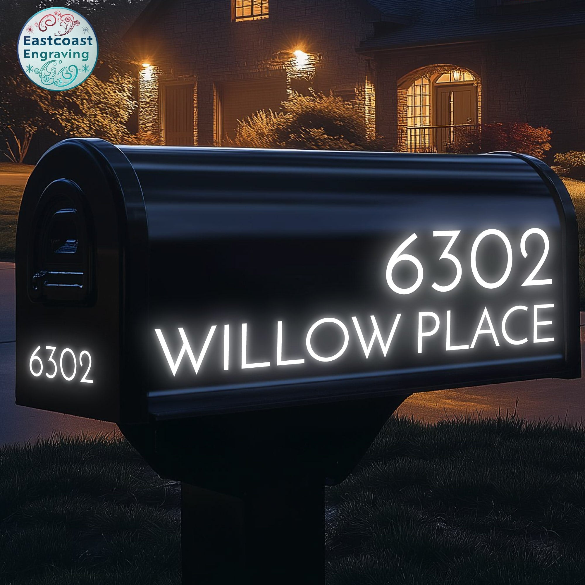 Black mailbox with reflective vinyl address numbers by Eastcoast Engraving, glowing under headlights for enhanced nighttime visibility.